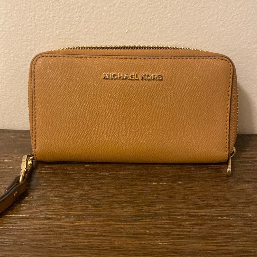 Michael Kors tan wallet.